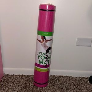 Unused pink yoga mat